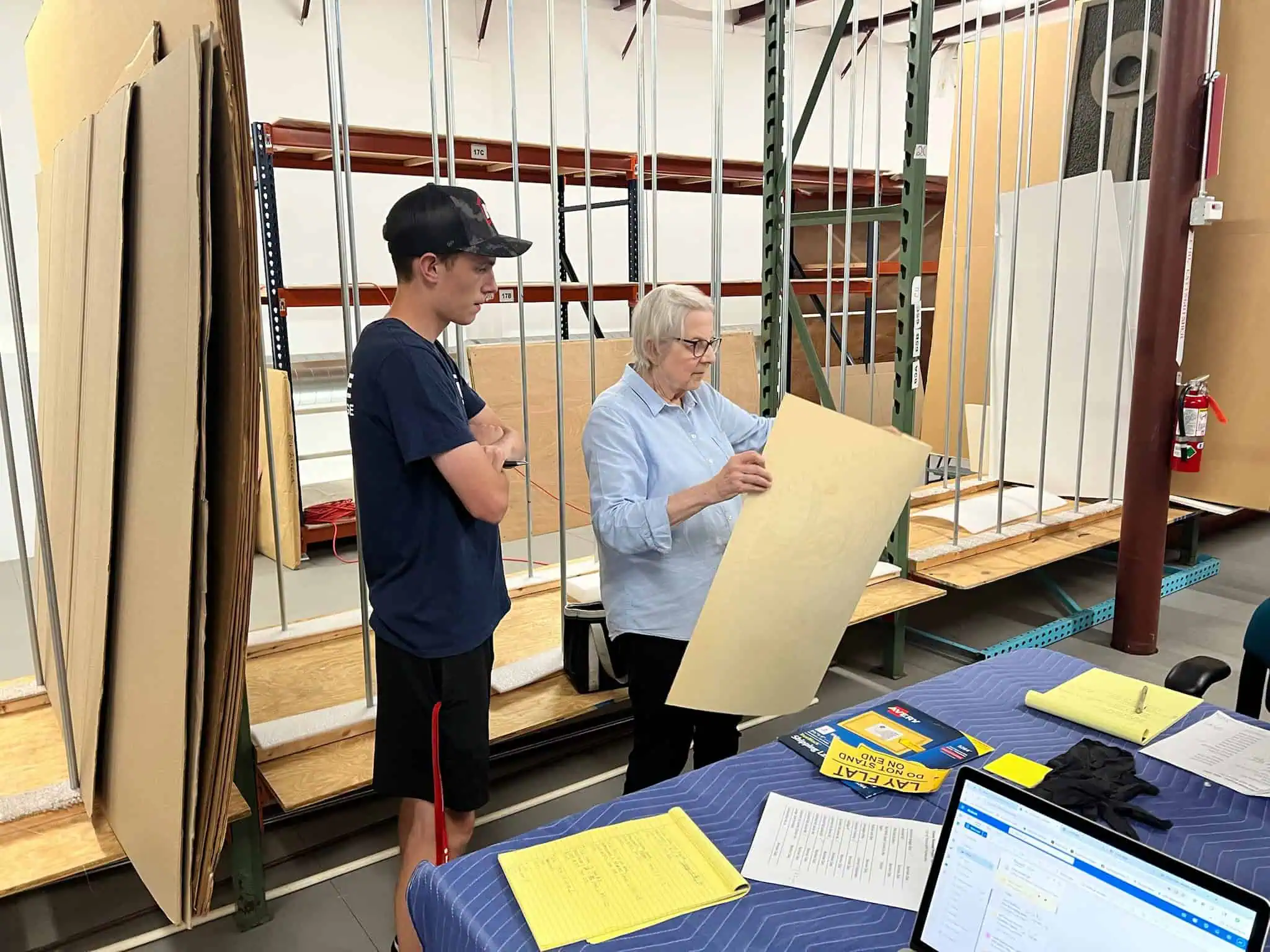 Naglee staff member working at a packing station