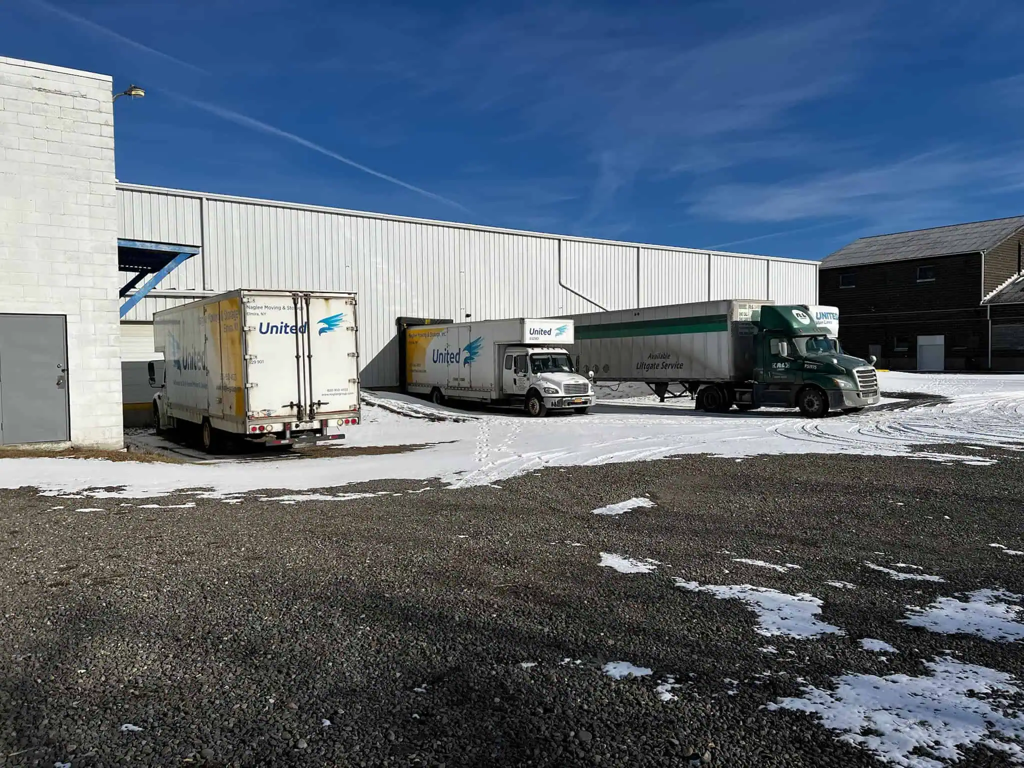 Naglee warehouse building with truck at the dock