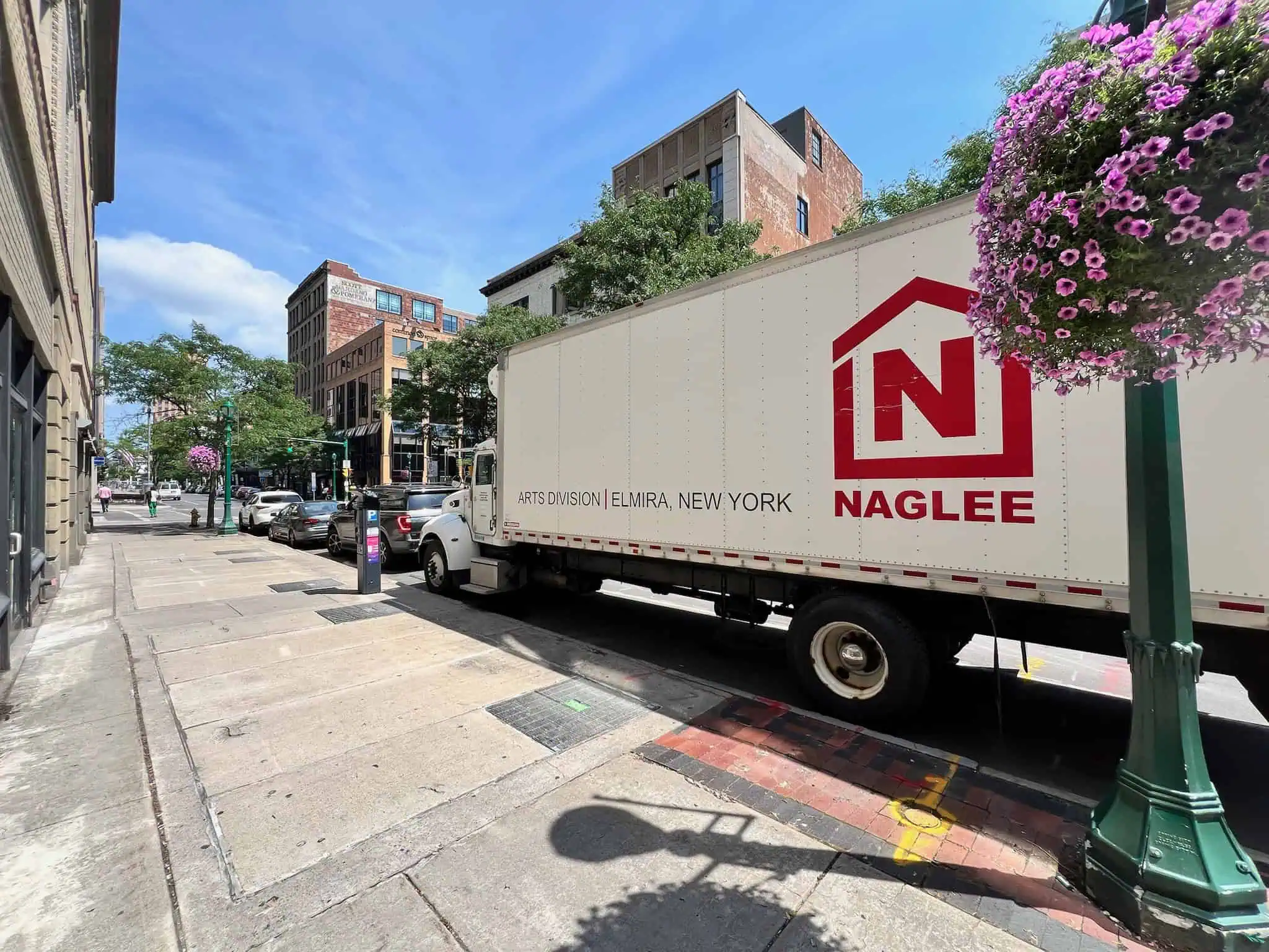 Naglee mover carrying a boxed item